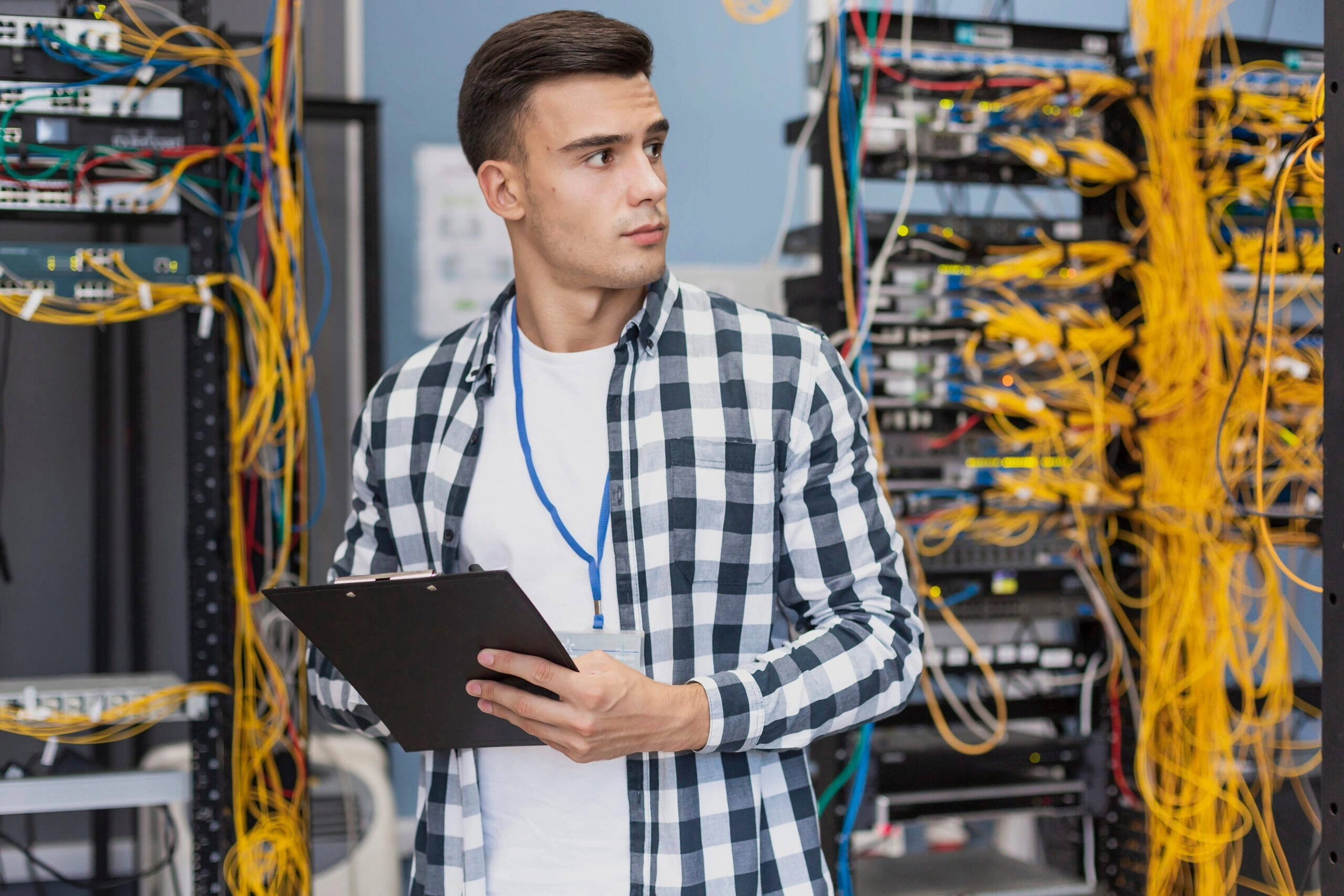 Engineer Monitoring Industrial IoT Systems